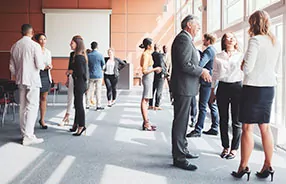 diverse people networking at meeting